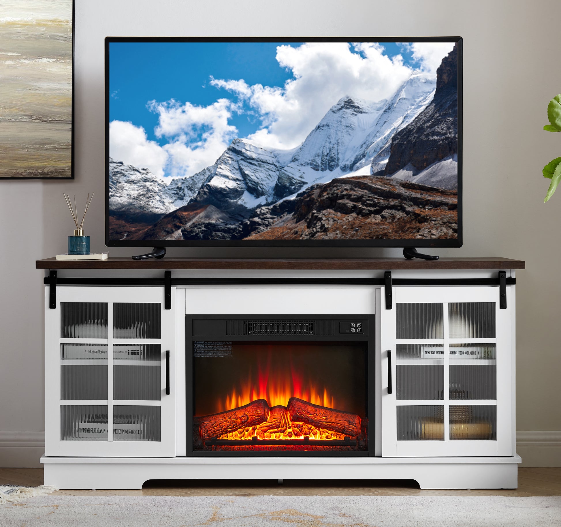 White fireplace TV stand with sliding barn doors and glass cabinets
