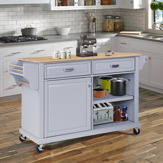 Gray kitchen island with butcher block top and stainless steel appliances