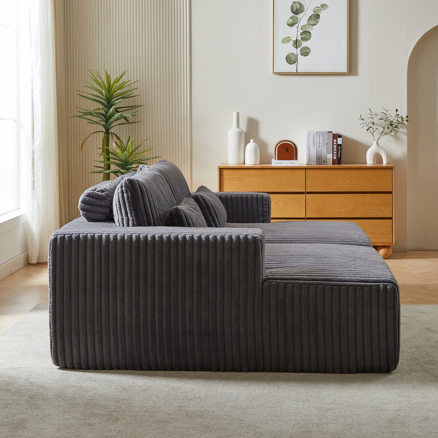 Dark grey corduroy sectional sofa with plush cushions modern living room accent