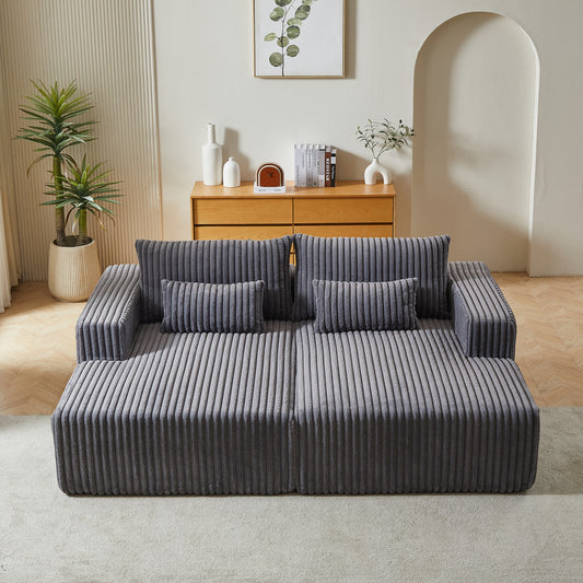 Plush corduroy sectional sofa in charcoal grey with deep seating and multiple throw pillows