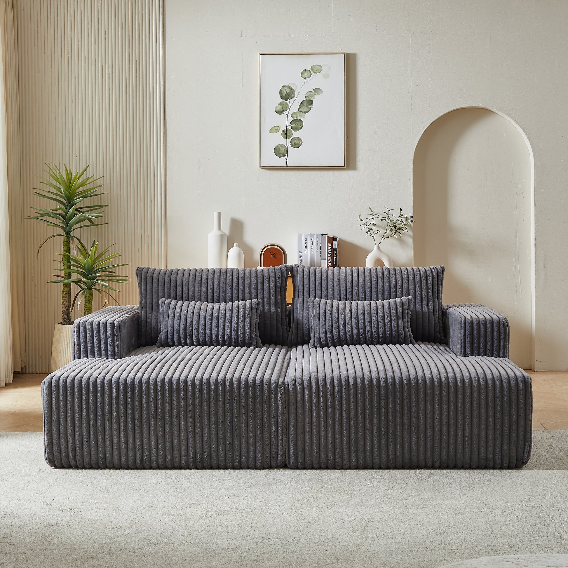 Plush corduroy fabric sofa in charcoal gray with deep channel tufting for ultimate comfort