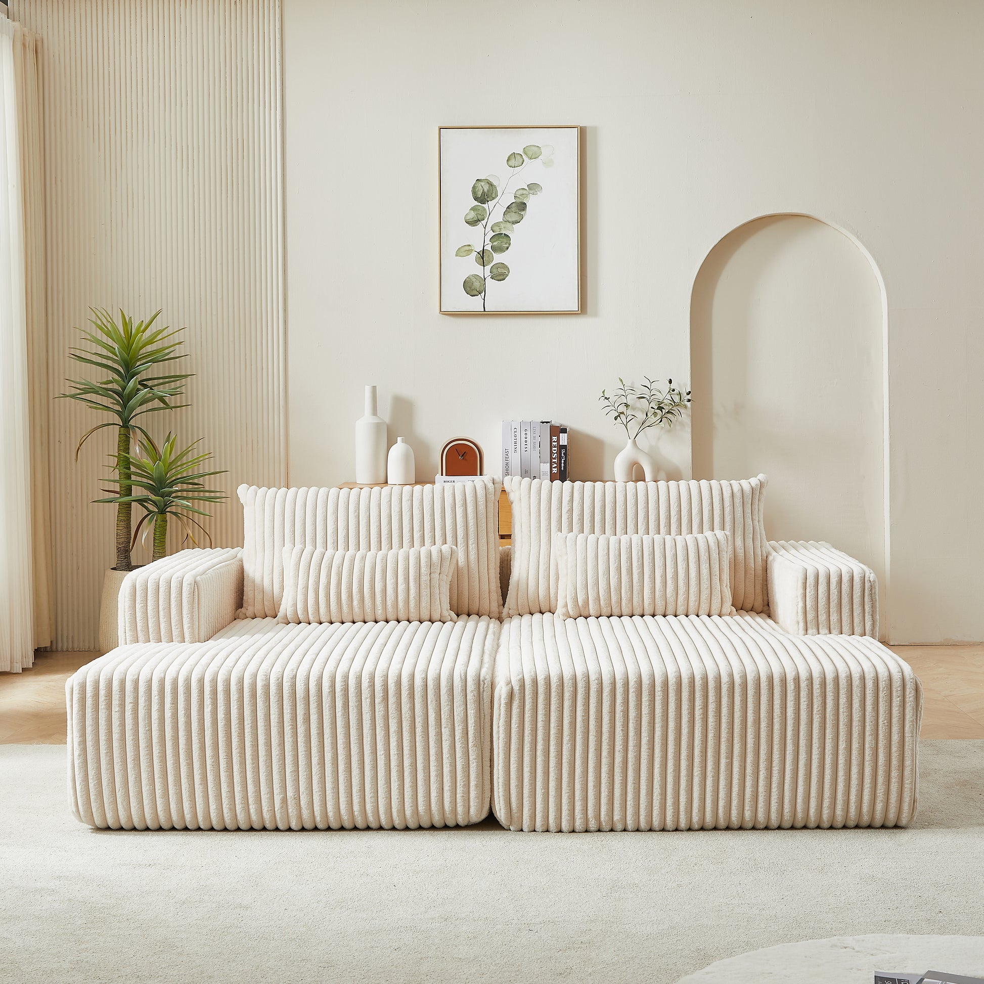 Cream corduroy sectional sofa with plush cushions and a modern minimalist design