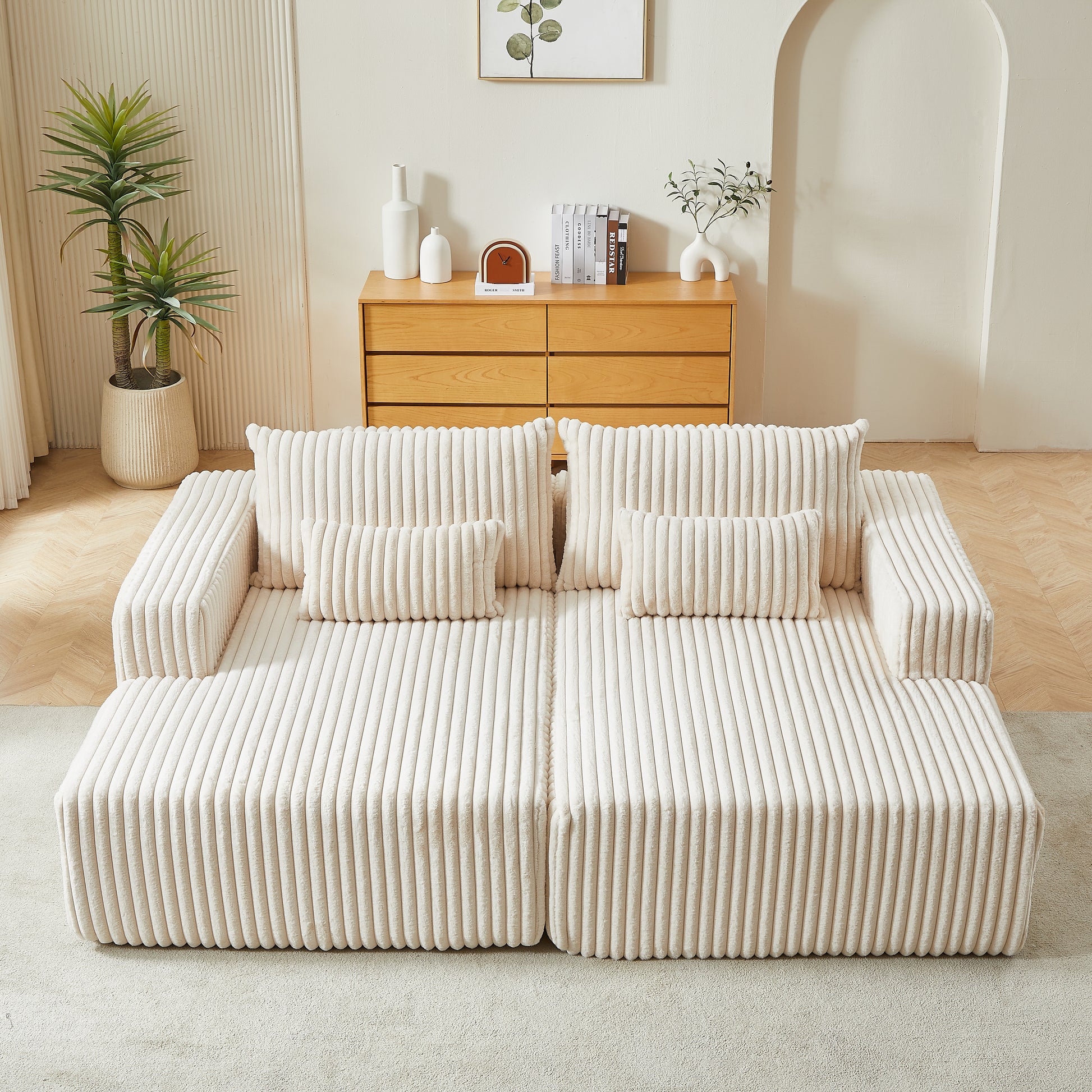 Cream corduroy modular sofa with plush cushions and a modern design
