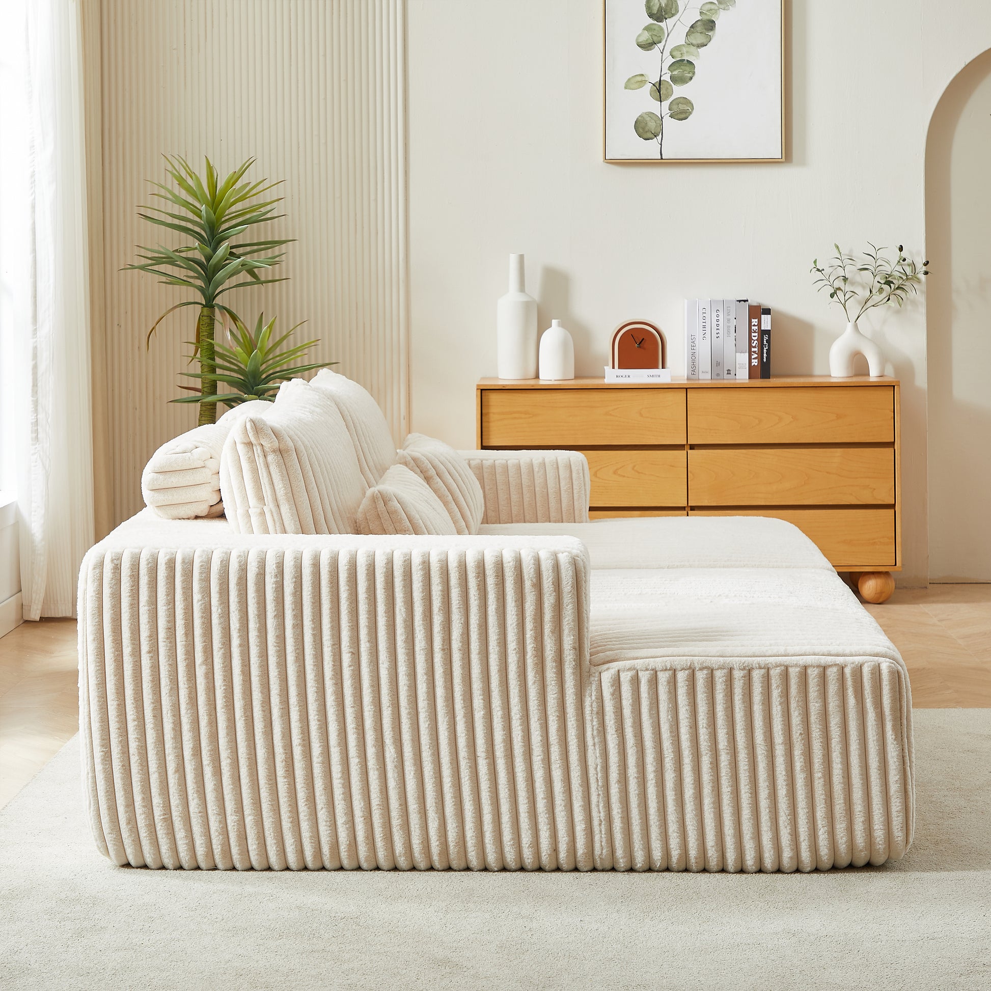 Beige corduroy sectional sofa with plush cushions perfect for a modern living room