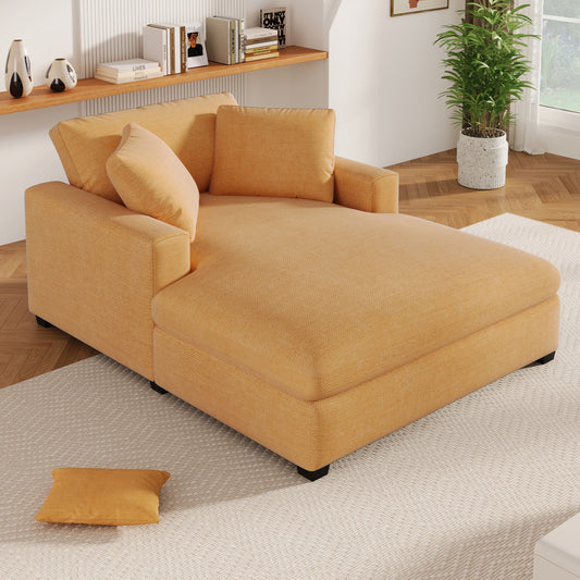 Contemporary orange linen chaise lounge with plush cushions and dark legs