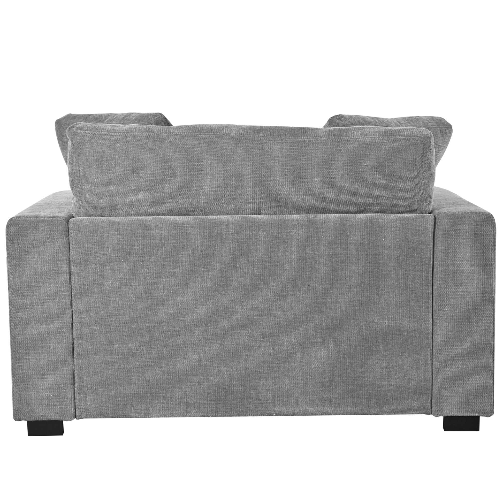 Modern grey fabric couch with plush back cushions perfect for living rooms