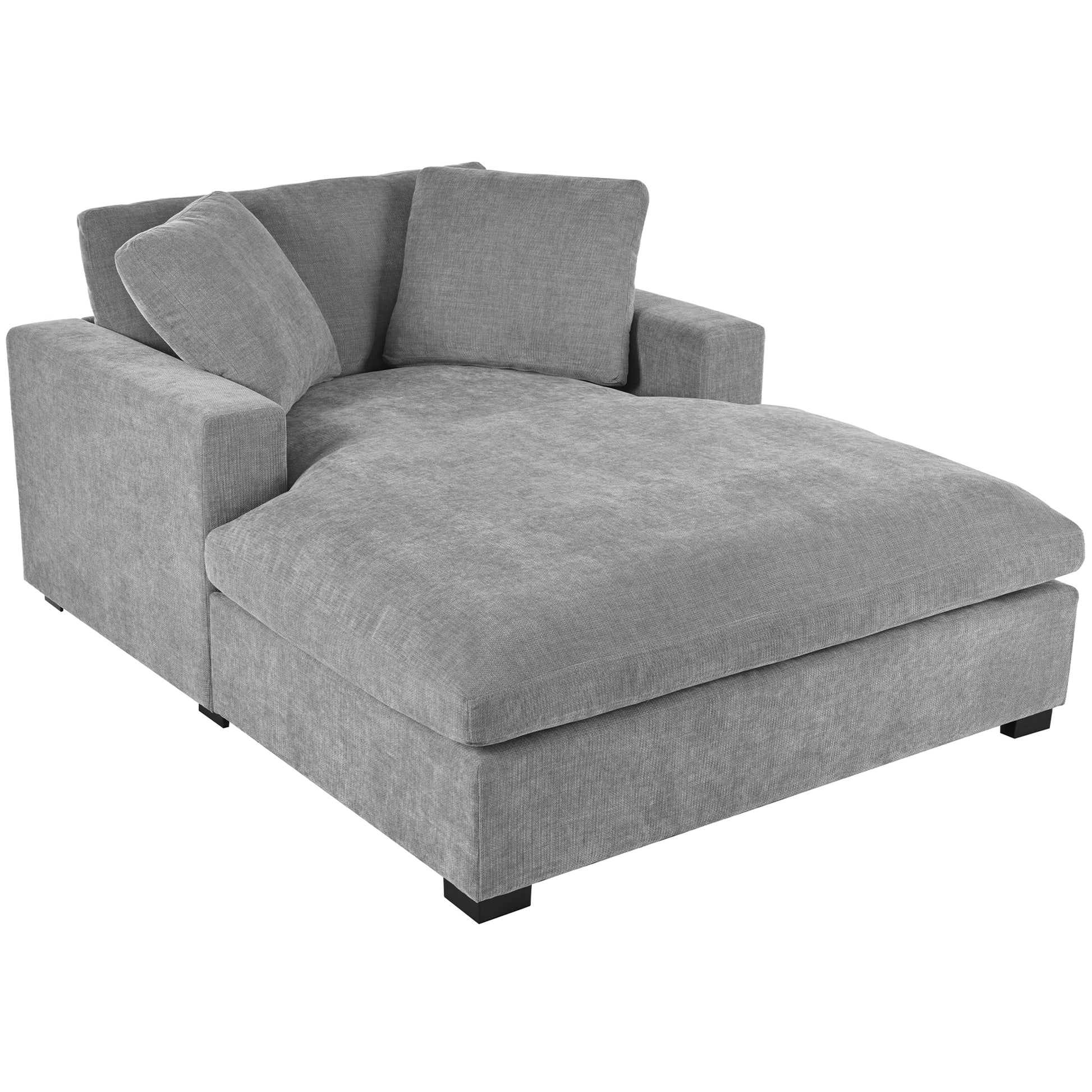 Plush grey fabric sectional chaise lounge with clean lines and modern black feet perfect for relaxation