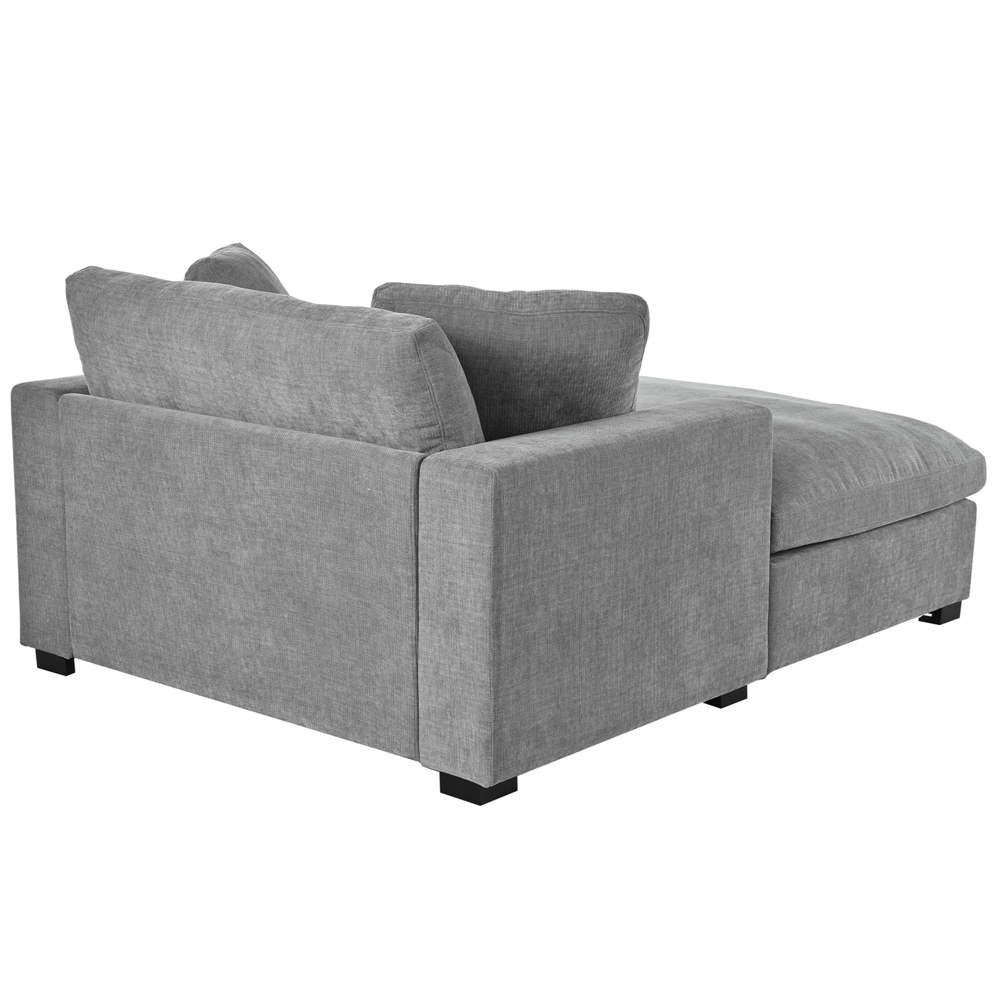 Grey fabric sectional sofa with chaise lounge and plush cushions
