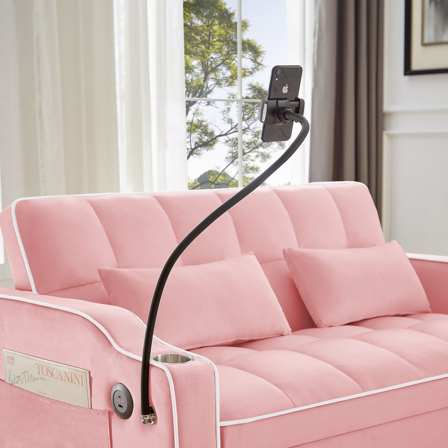 Pink velvet sofa with integrated USB charger and cup holder perfect for a modern living room