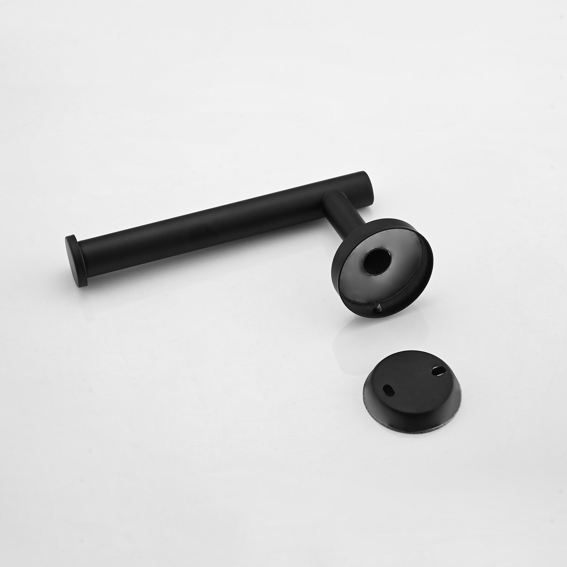 Matte black metal toilet paper holder with wall mount base