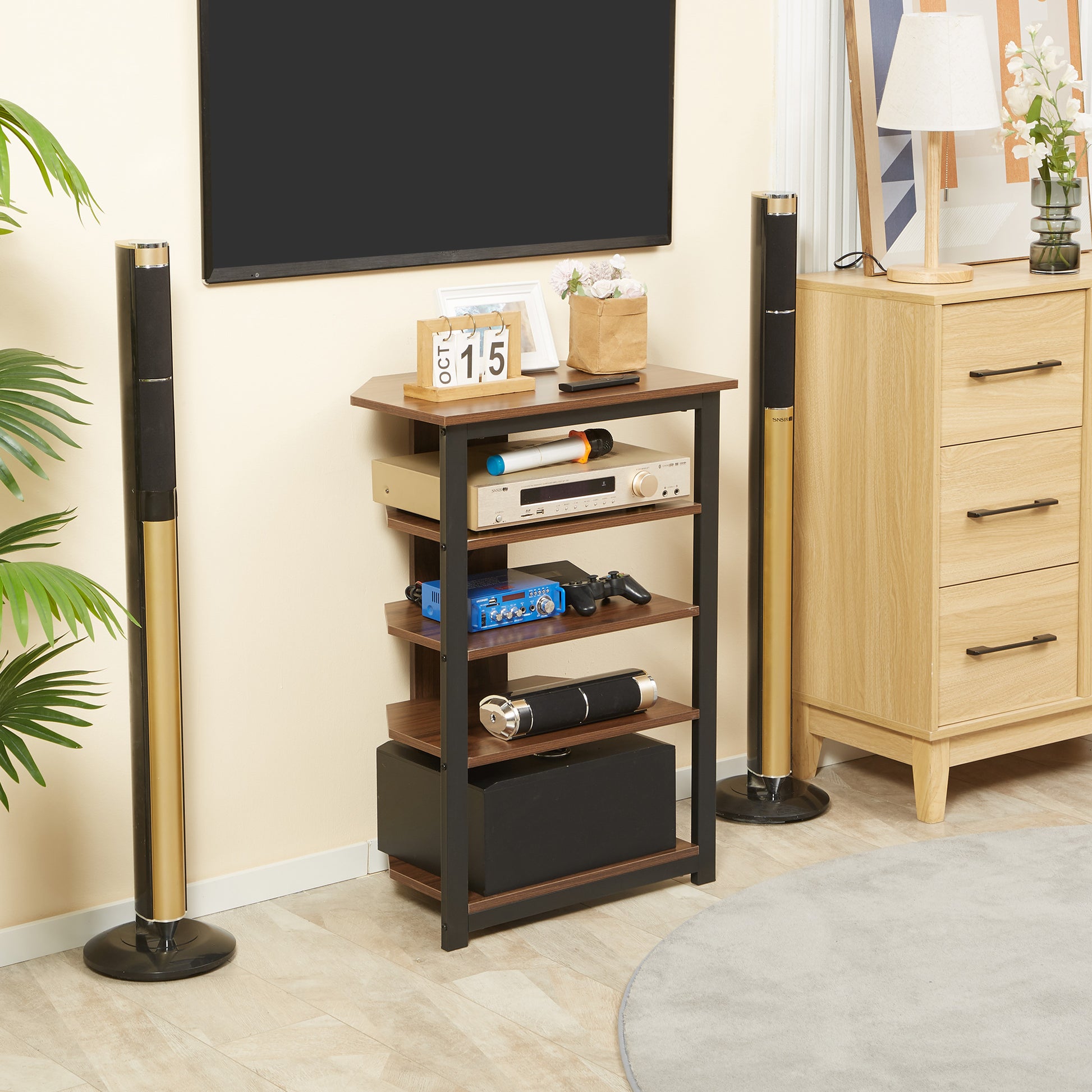 Compact media console with walnut finish holds electronics and audio equipment