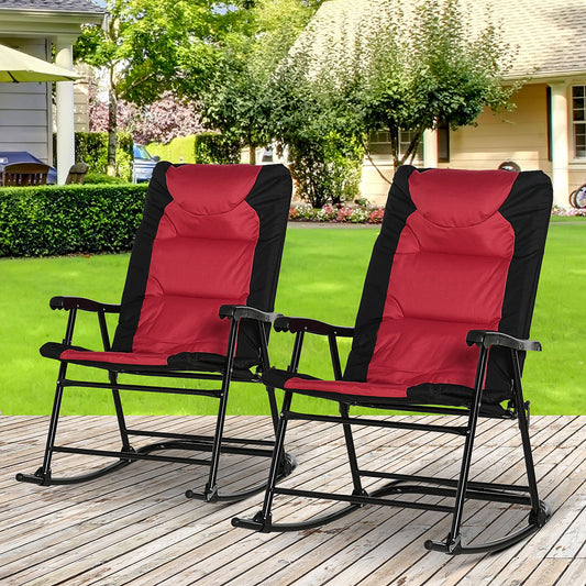 Two red and black upholstered rocking chairs with metal frames on a wooden deck