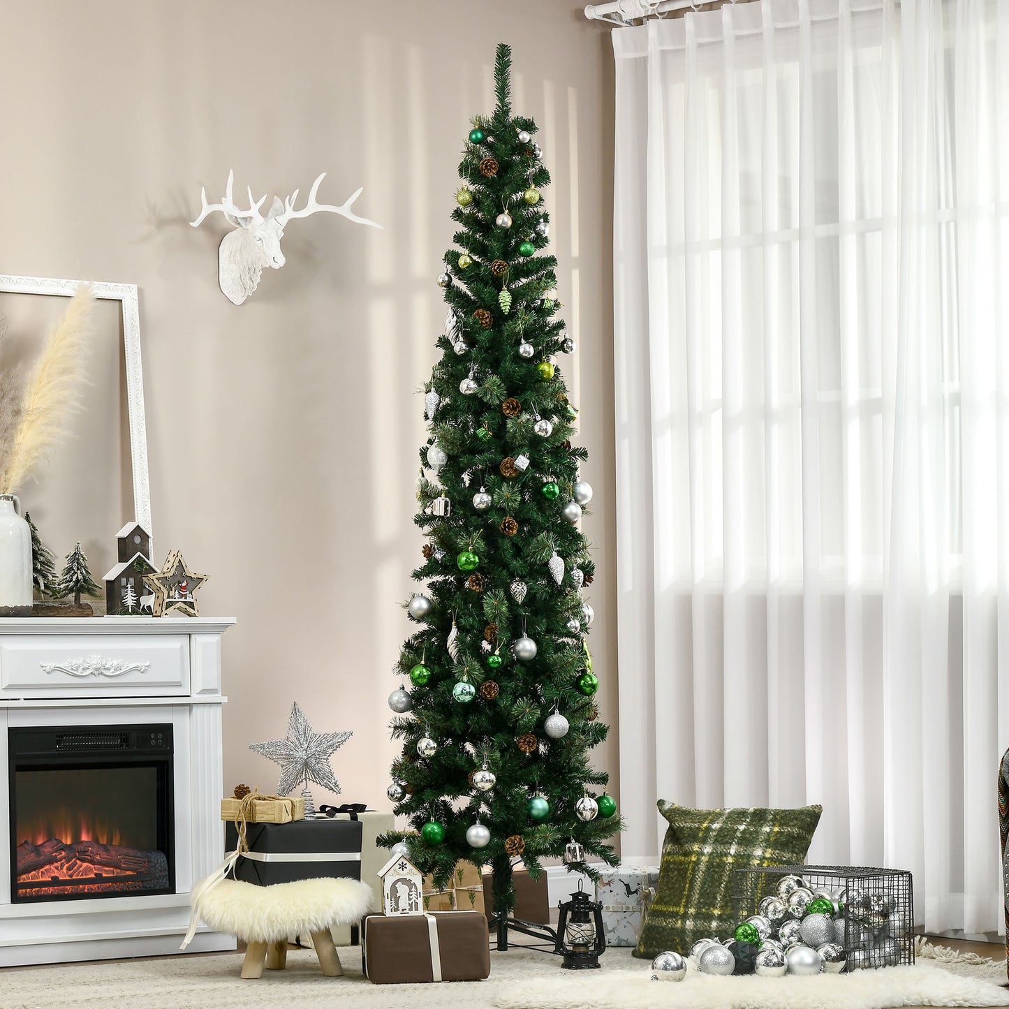 Slim artificial Christmas tree with green and silver ornaments