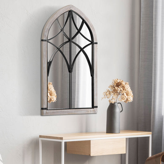 Gothic arched wall mirror with weathered wood frame and black metal accents