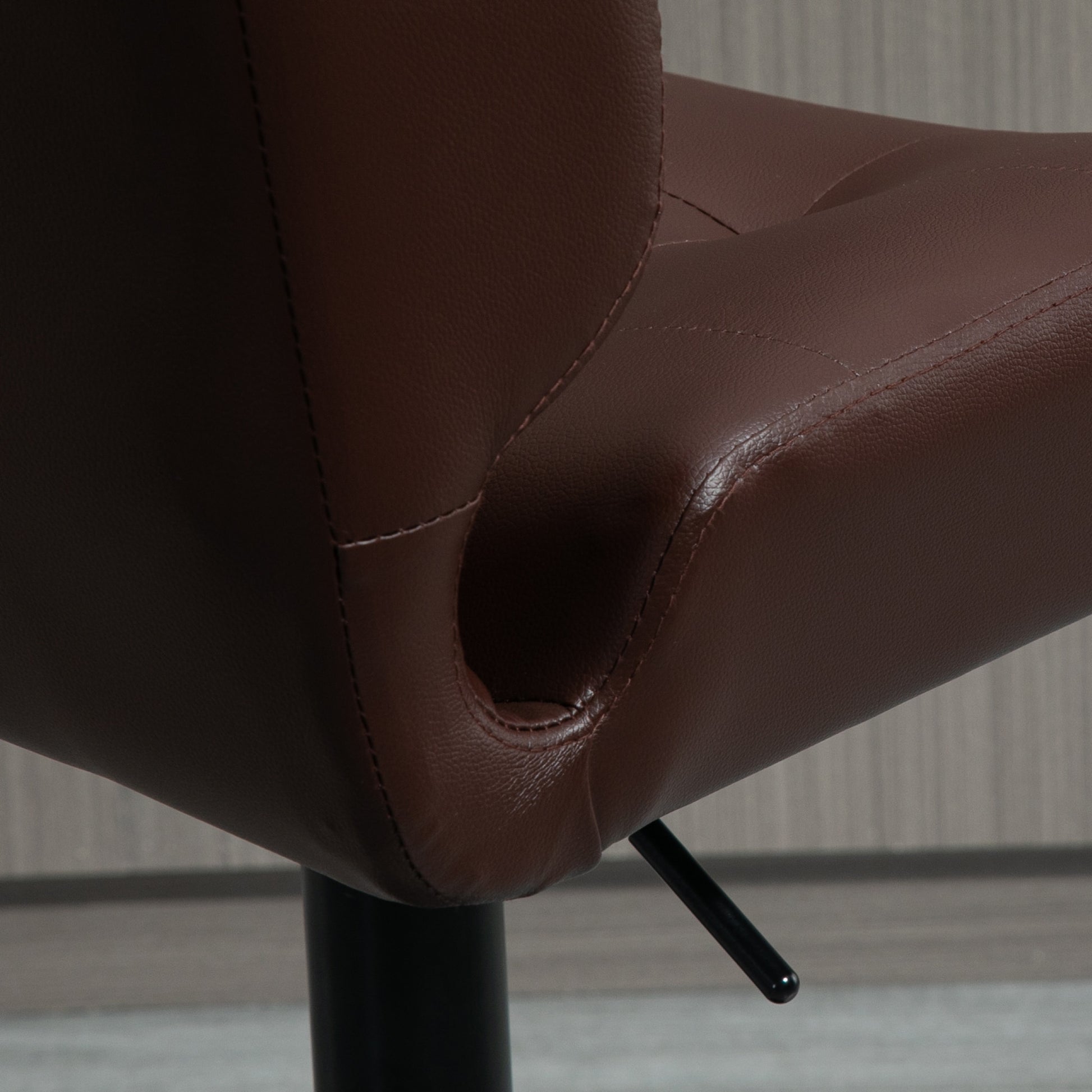 Brown faux leather executive chair seat cushion with stitched detailing and cutout