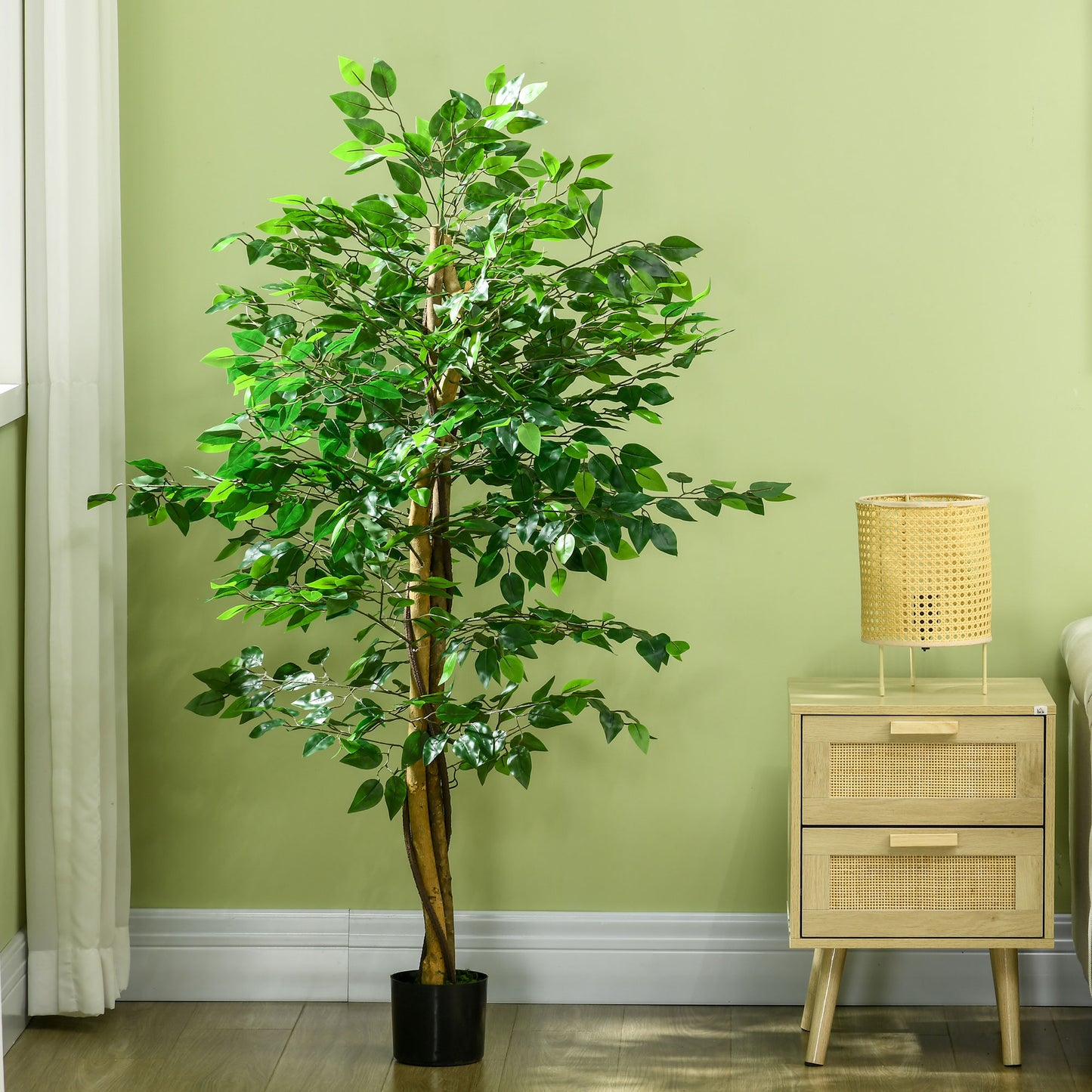 Tall artificial ficus tree with lush green leaves perfect for home decor