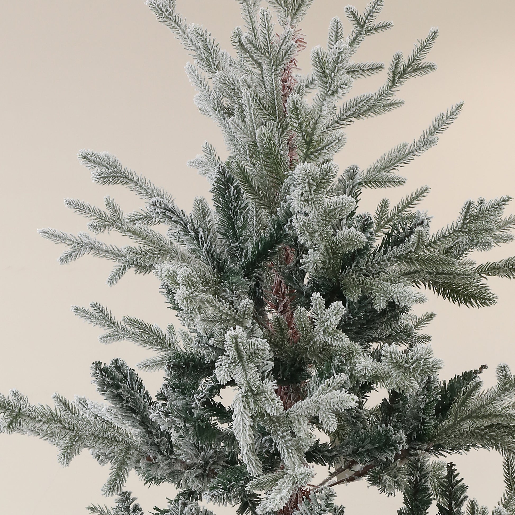 Frosted pine tree branches realistic artificial Christmas tree with flocked tips