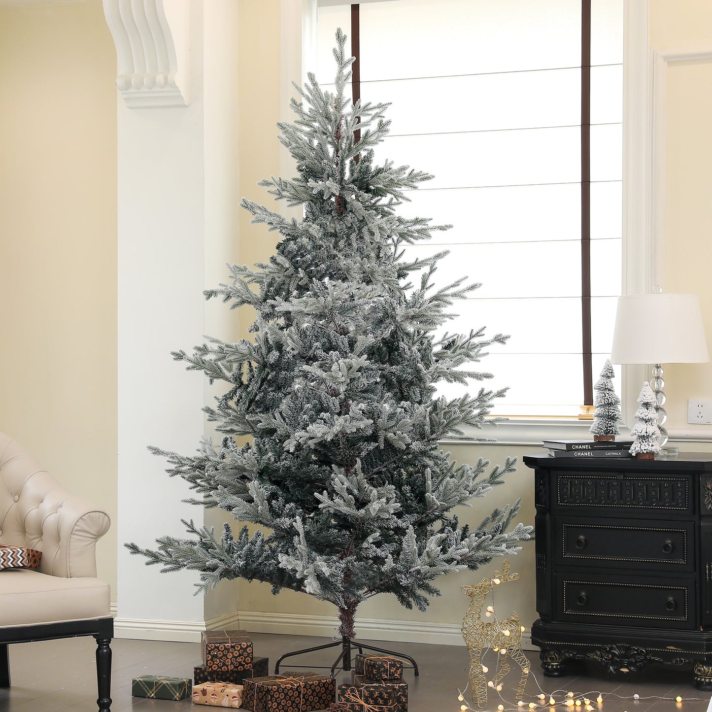 Flocked artificial Christmas tree with realistic branches and a natural look
