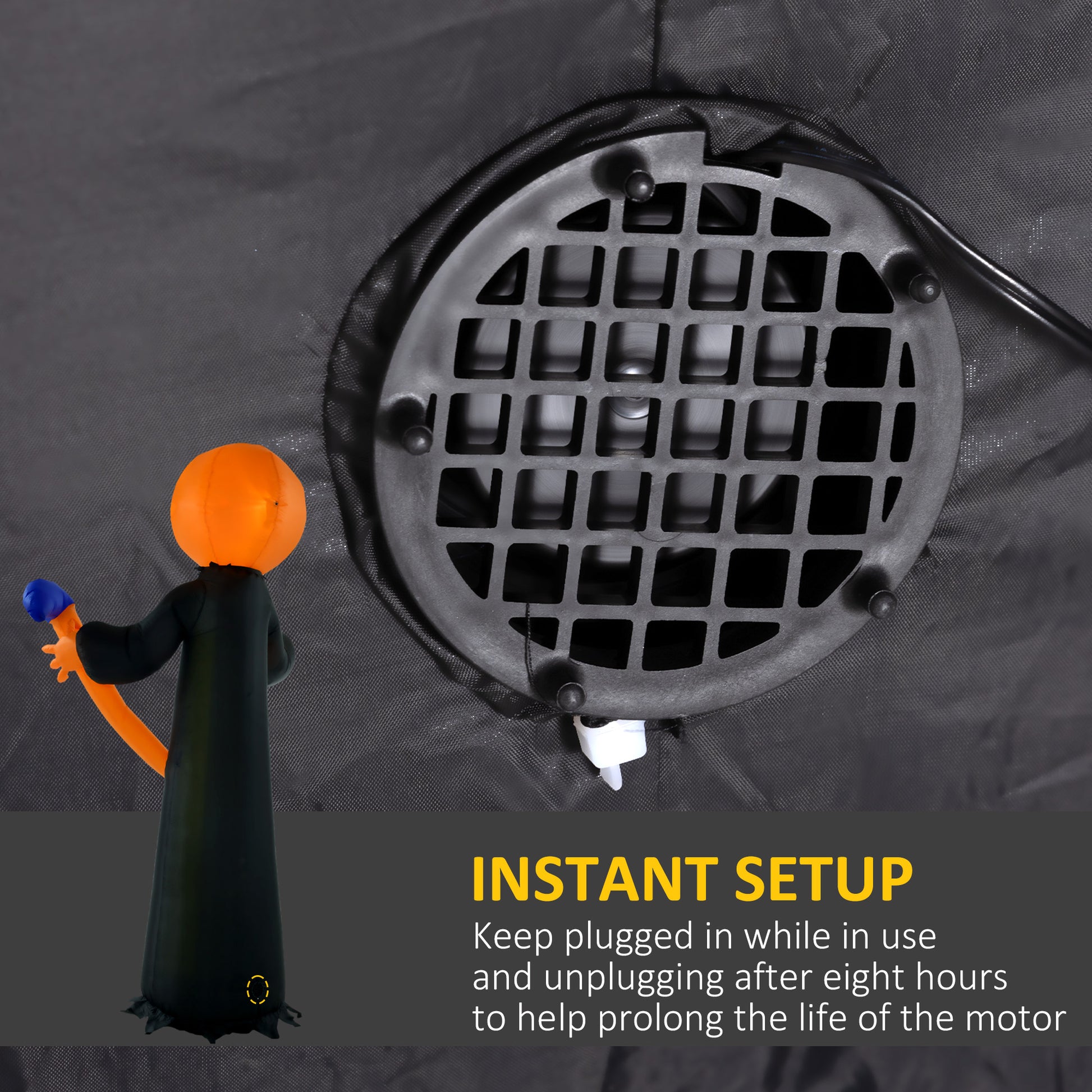 Black inflatable pumpkin character with orange head and blue tipped wand next to a blower fan grill