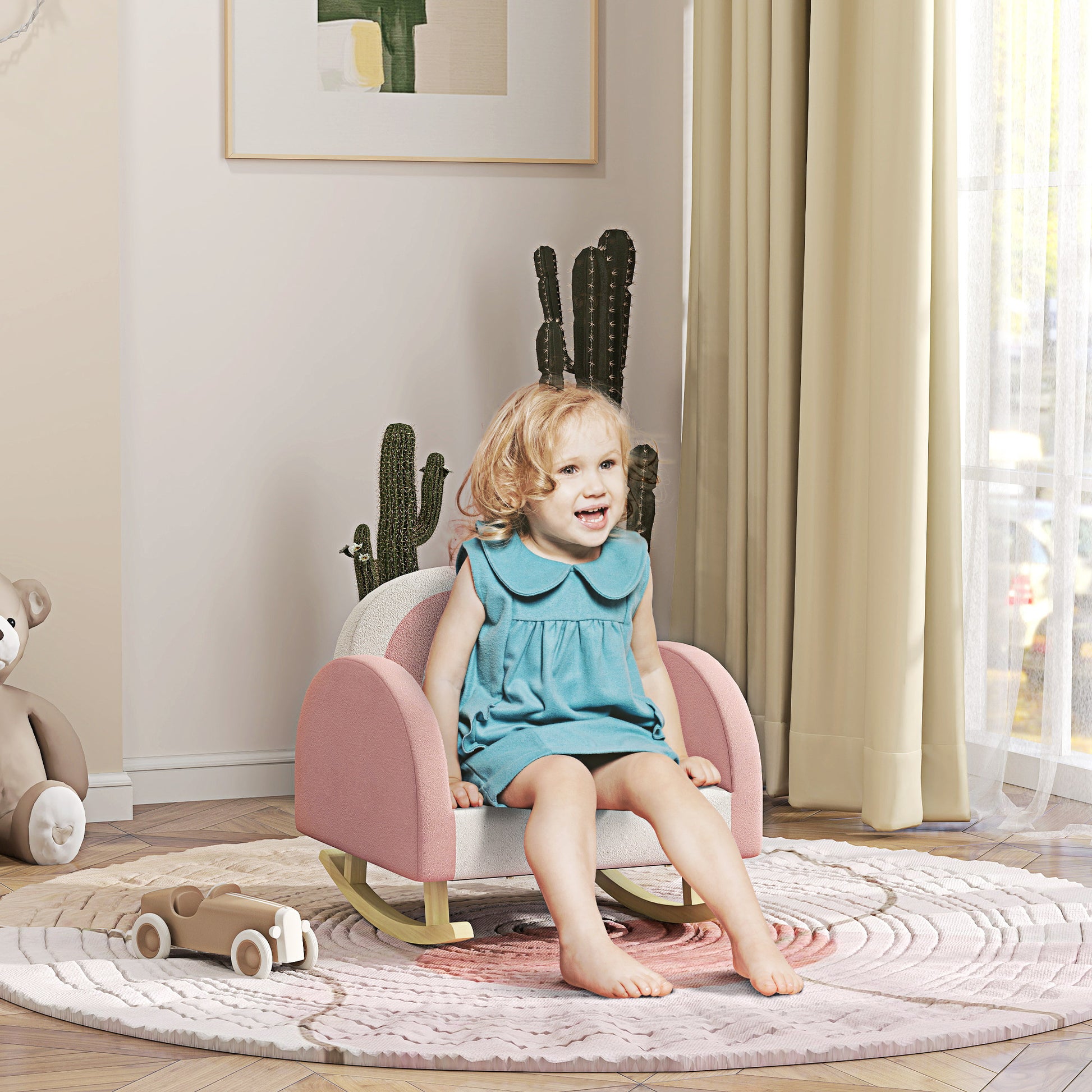 Pink upholstered rocking chair with arched back for toddler playtime
