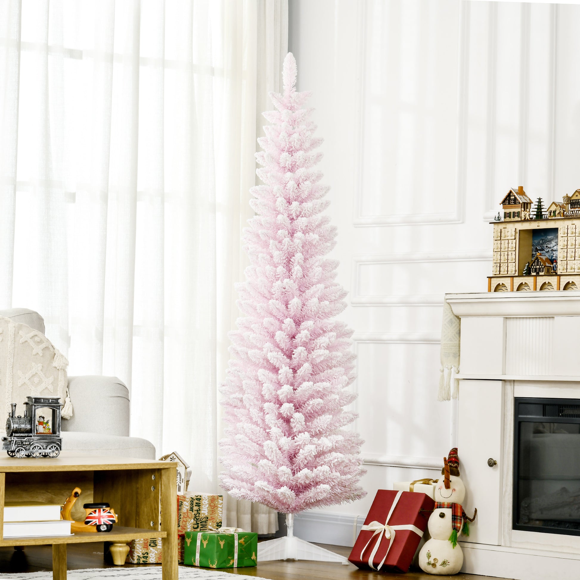 Fluffy pink Christmas tree with white tips perfect for holiday decor