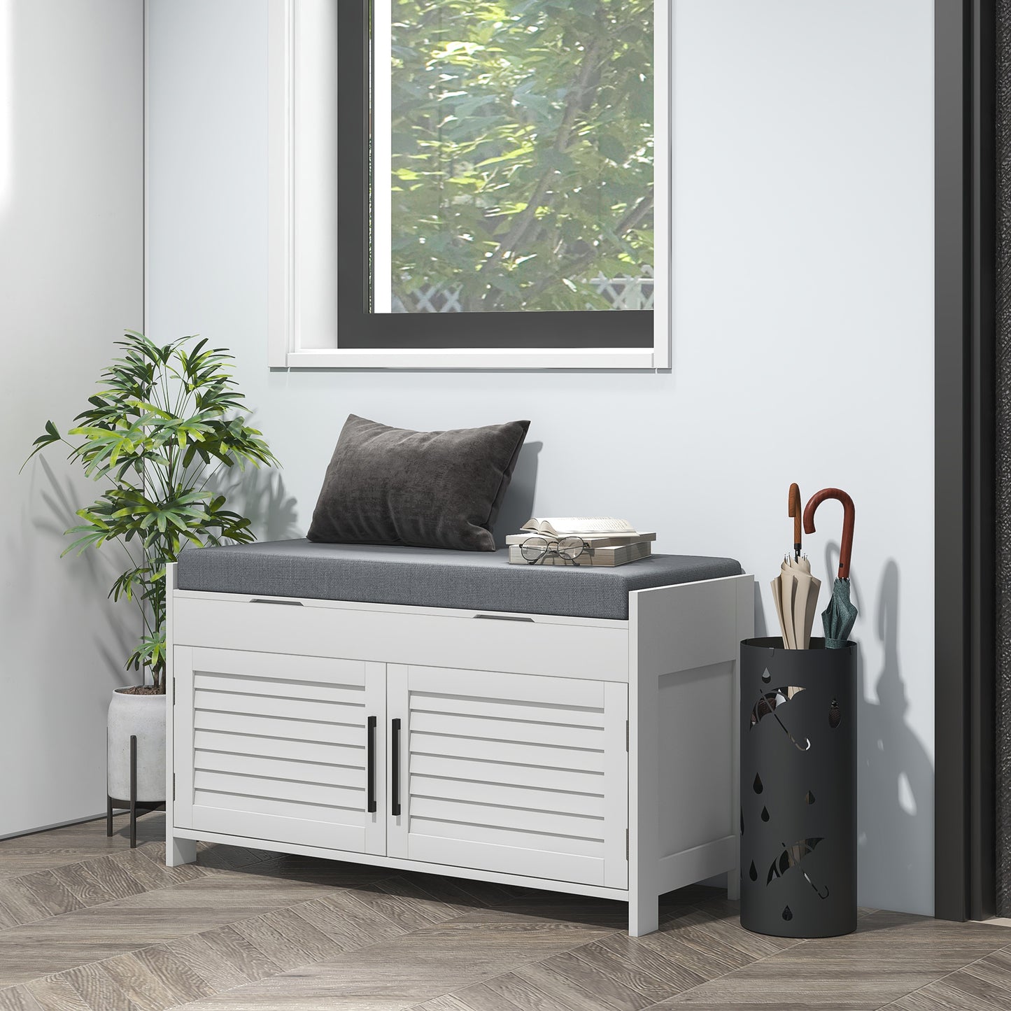 White entryway bench with gray cushion and louvered doors for shoe storage