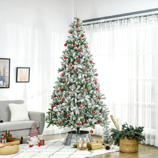 Flocked artificial Christmas tree adorned with red and silver ornaments ft