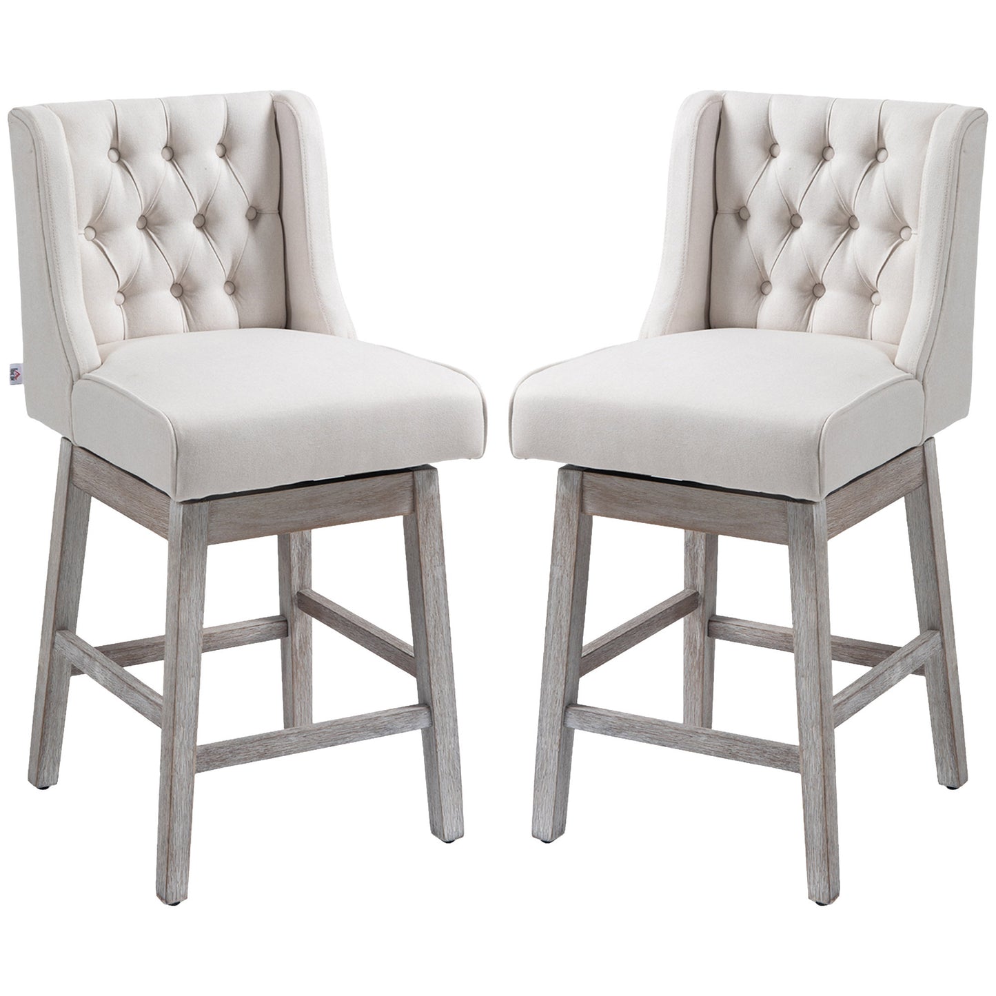 Pair of elegant cream linen tufted swivel bar stools with distressed wood legs