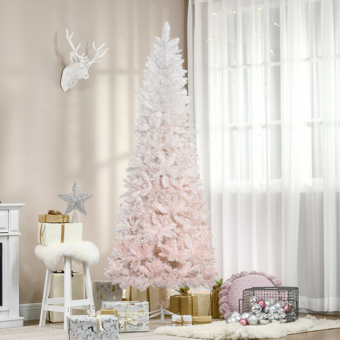 White and pink ombre artificial Christmas tree with flocked branches