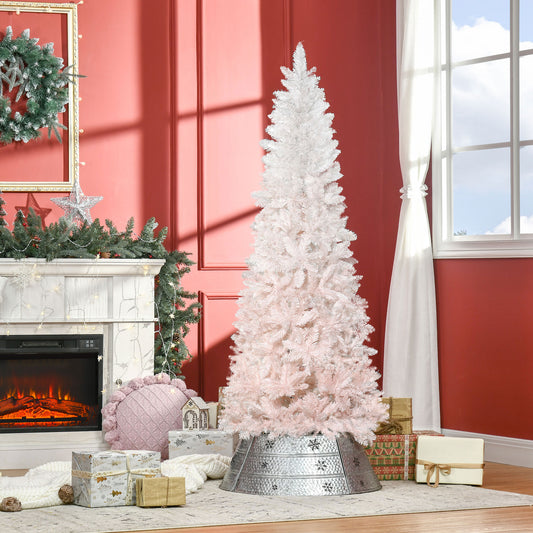 White and pink ombre artificial Christmas tree with festive holiday decor
