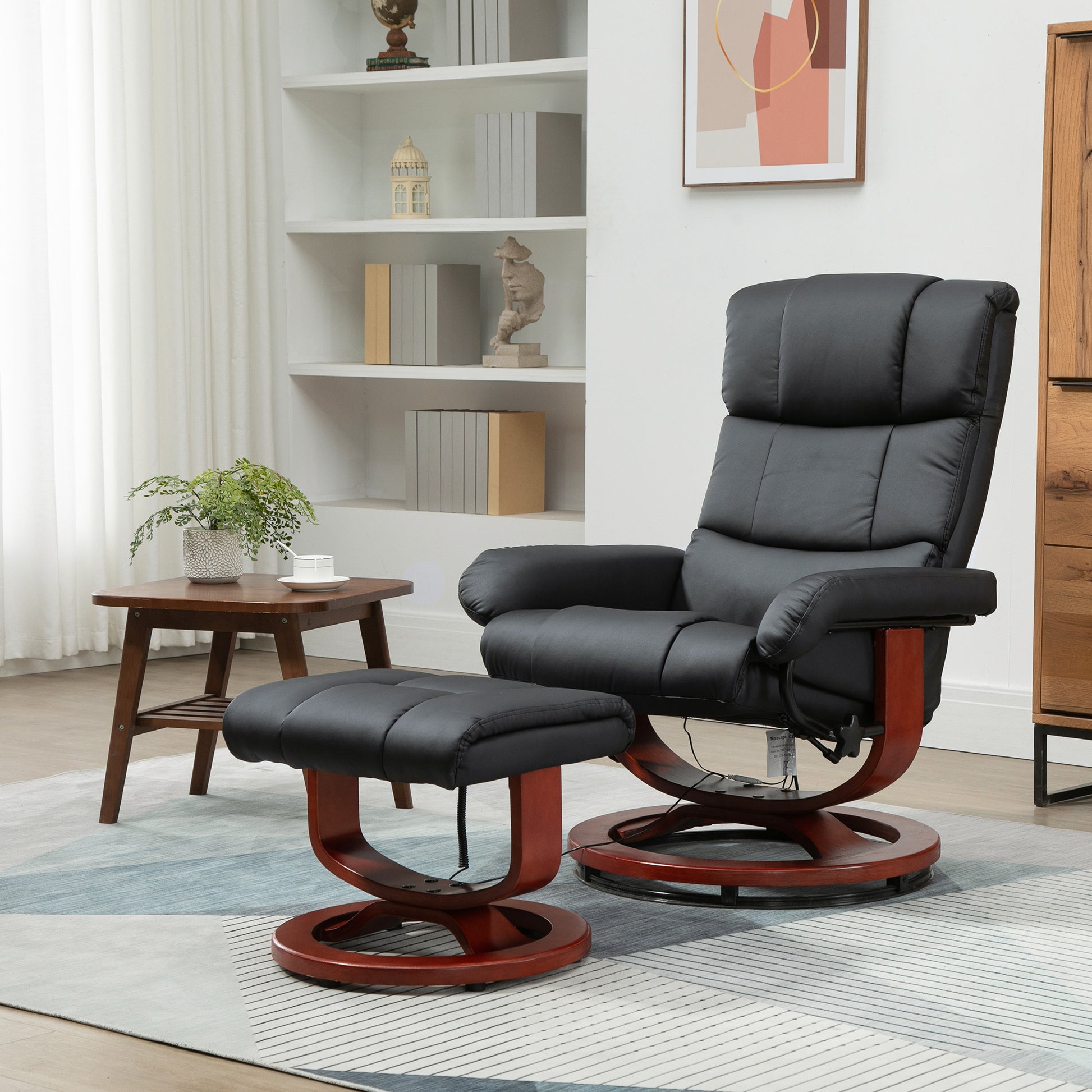 Black leather recliner chair and ottoman set with mahogany wood base ideal for living rooms