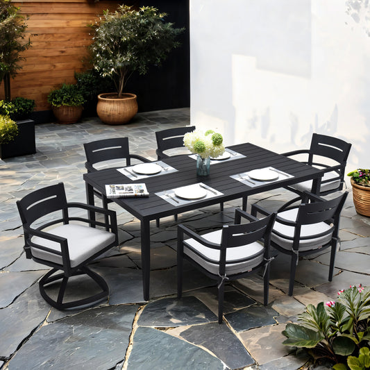 Black aluminum patio dining set with six chairs and a matching table perfect for outdoor gatherings