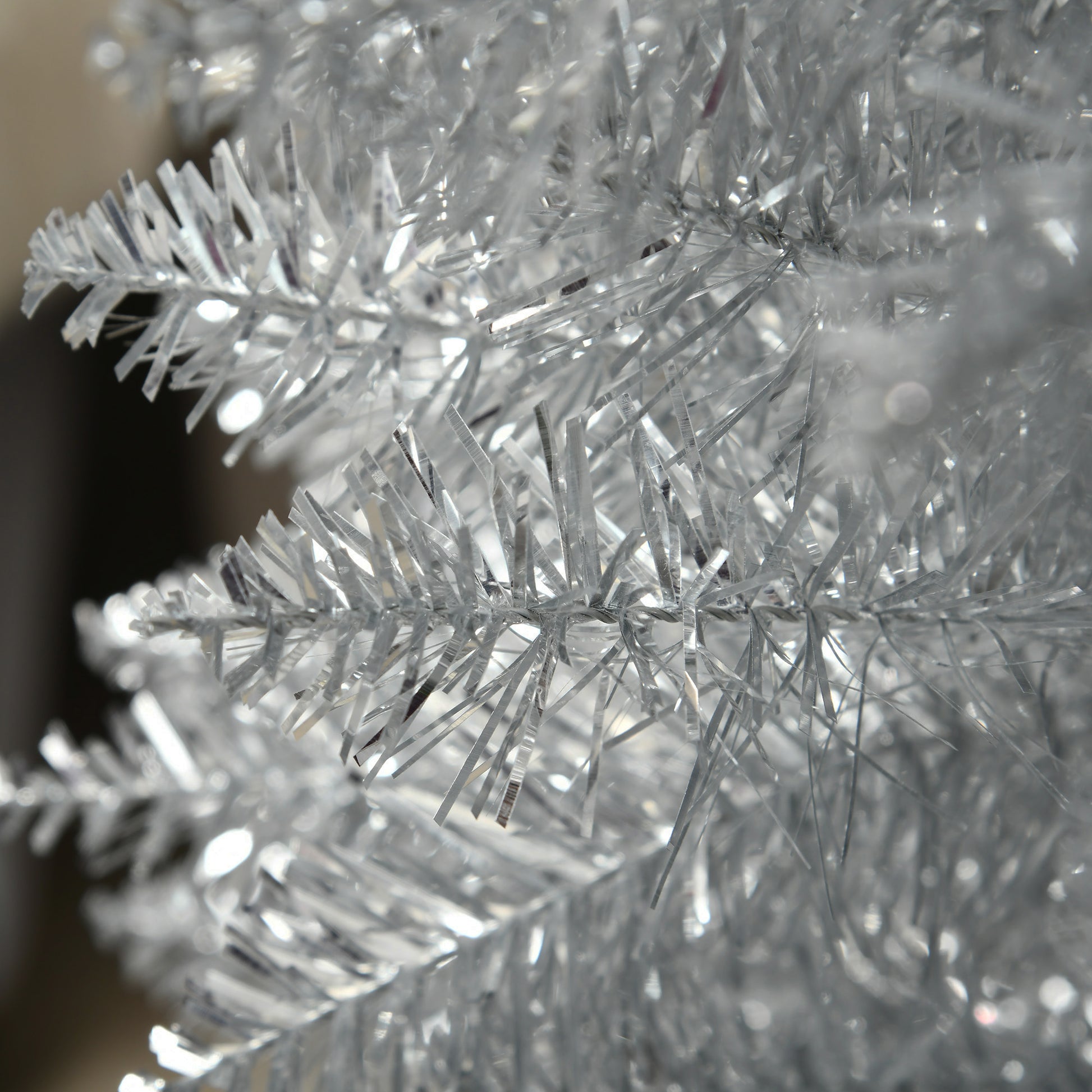Closeup of shimmering silver tinsel garland perfect for festive holiday decorations
