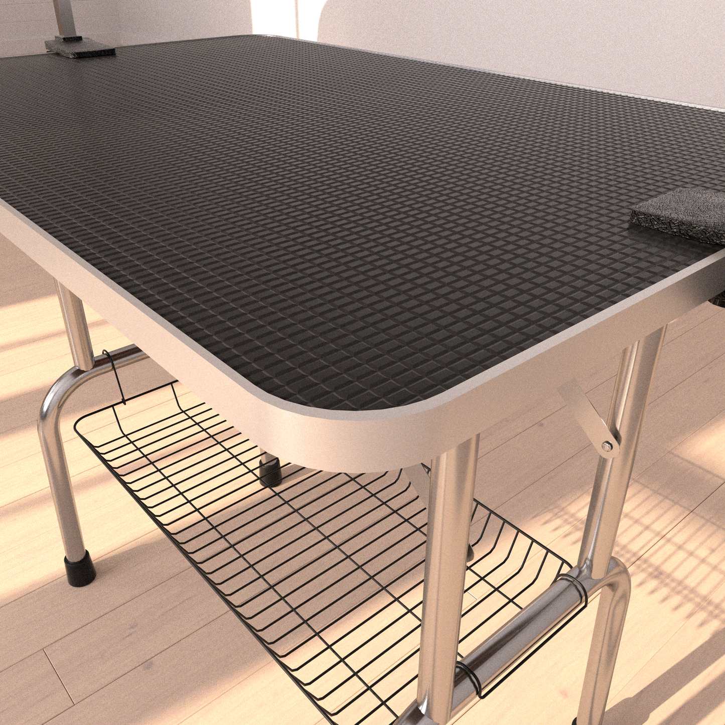 Sturdy black diamondpatterned grooming table with silver metal legs and storage basket