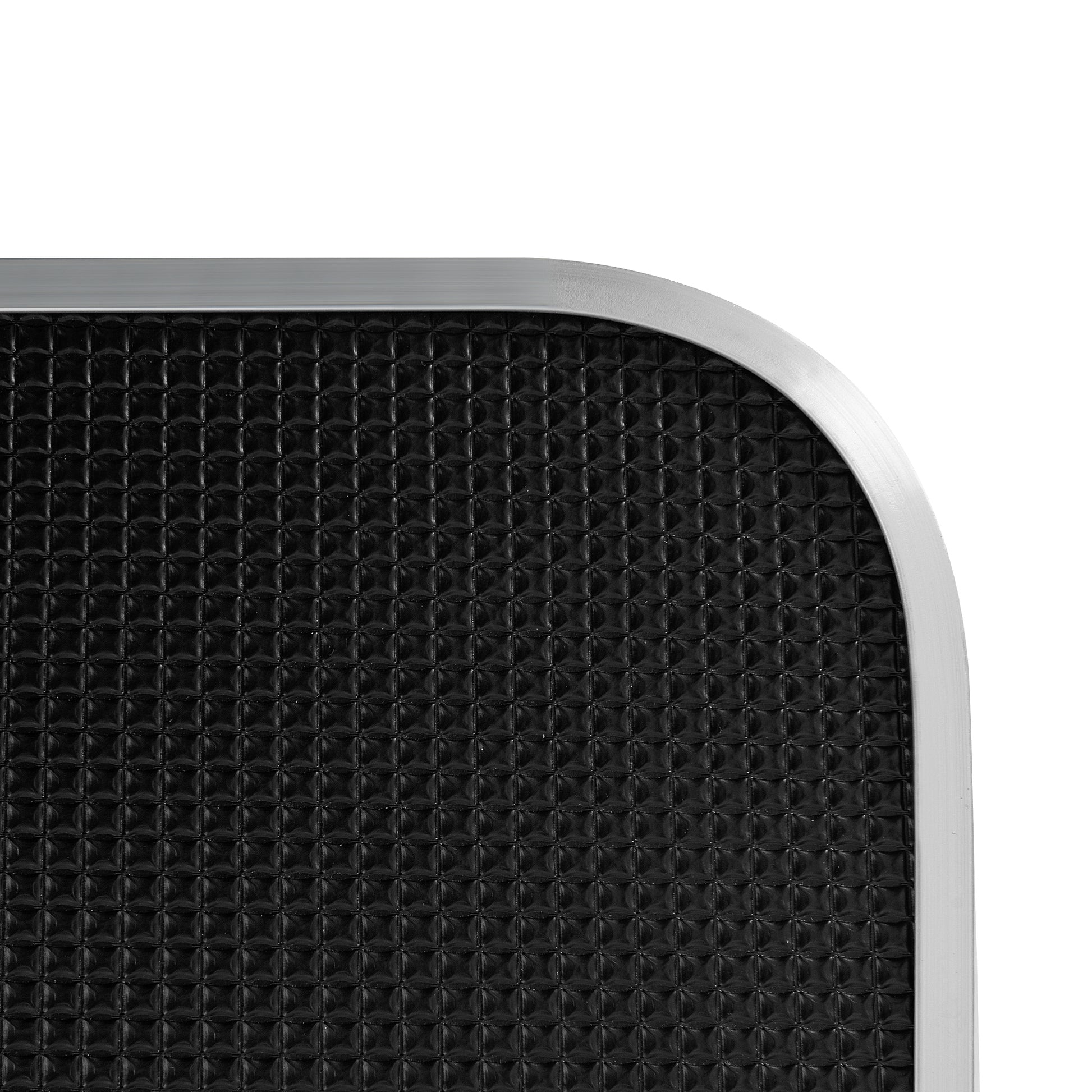 Black textured grip tape with brushed aluminum trim edge