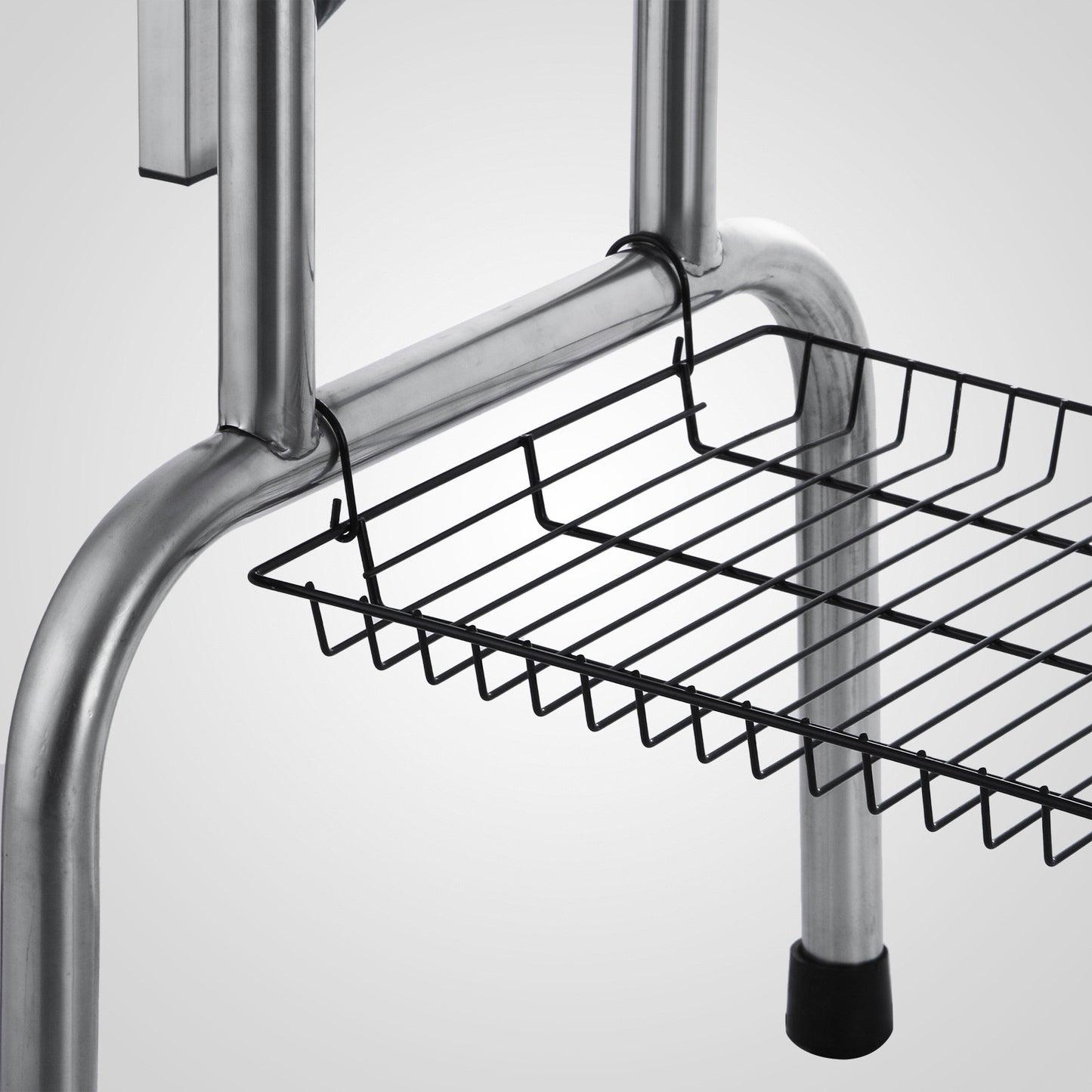 Chrome metal shelf unit with hanging black wire basket for organization