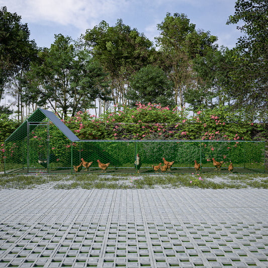 Green hexagonal mesh chicken coop with a gray roof and several chickens outside