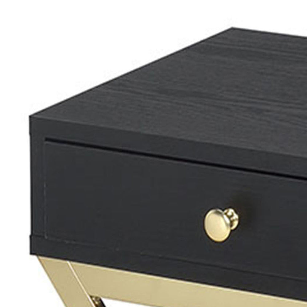 Black wood nightstand with gold drawer pull and metal legs