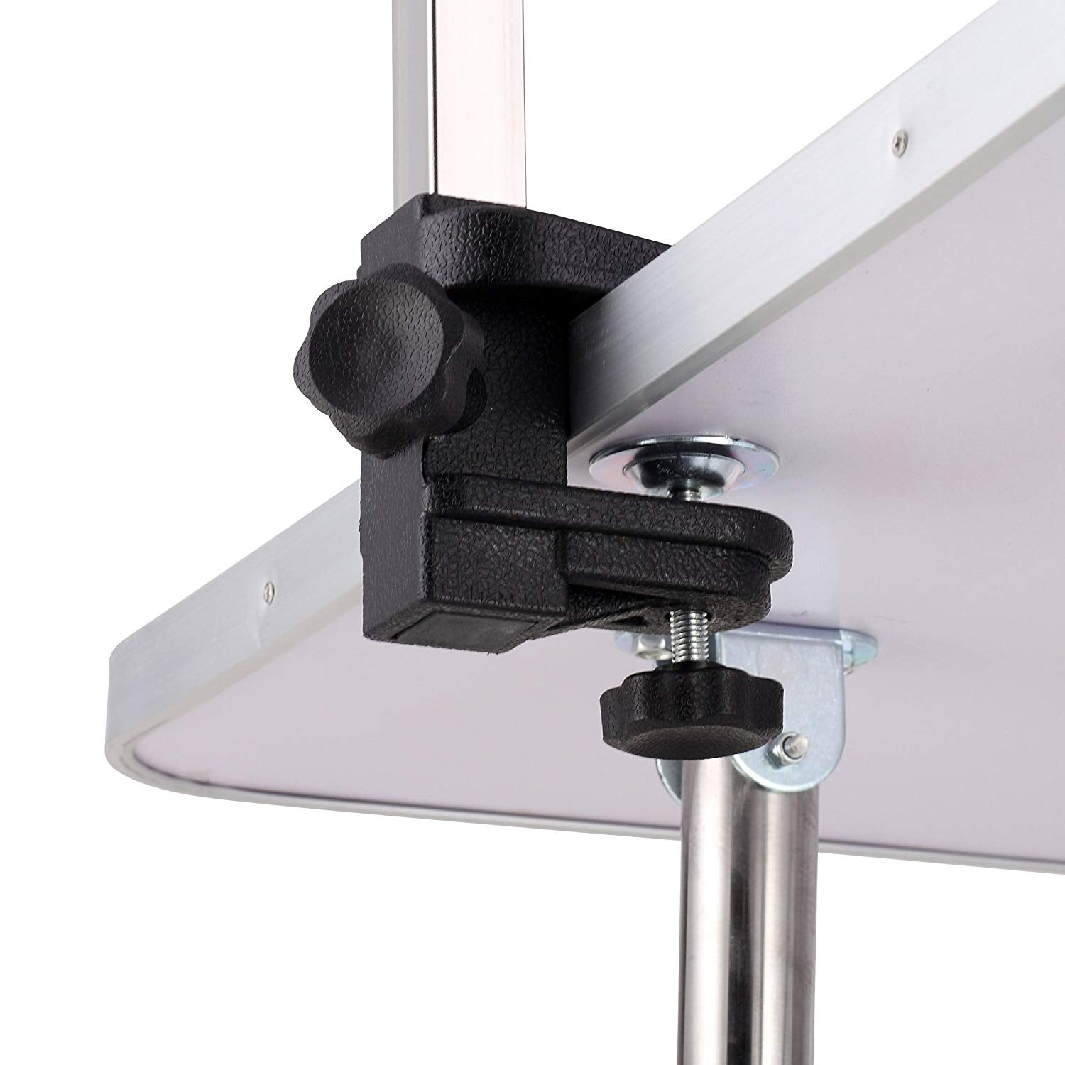 Black adjustable clamp with textured knob for securing to a table