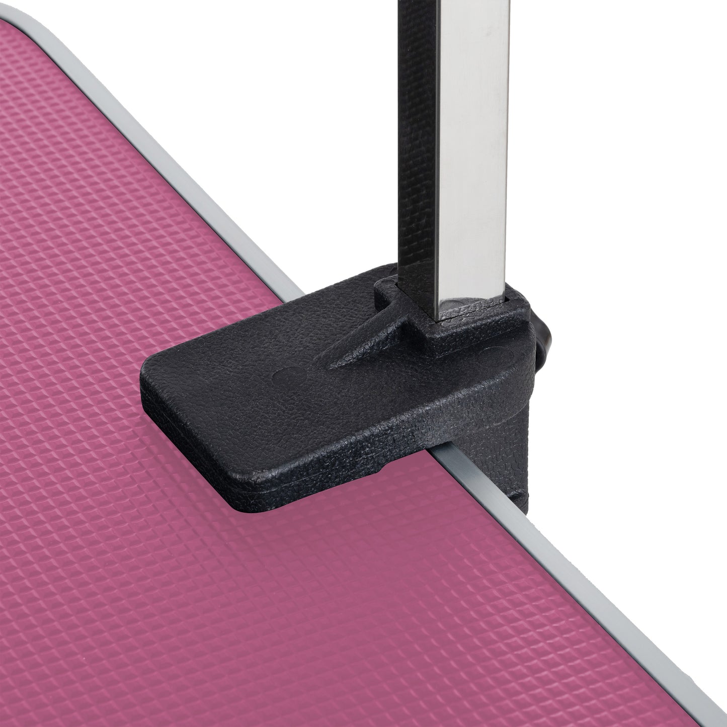 Pink textured grooming table surface with black clamp detail and chrome arm