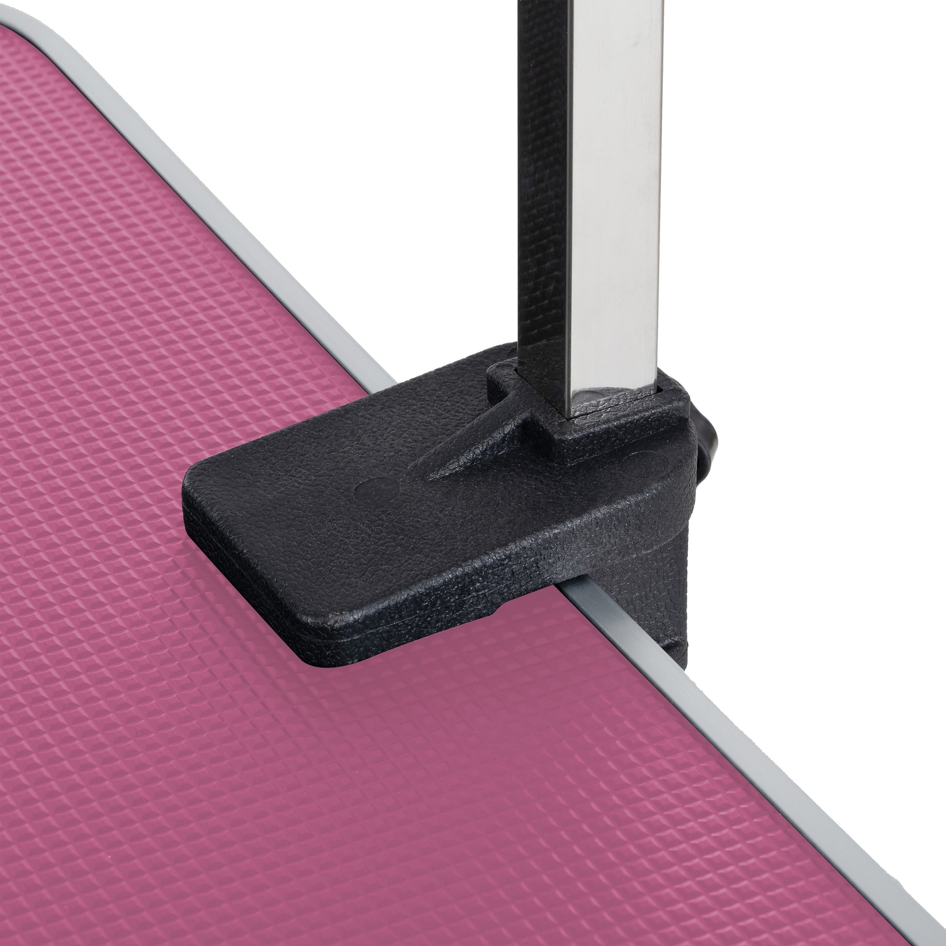 Pink textured grooming table surface with black clamp detail and chrome arm