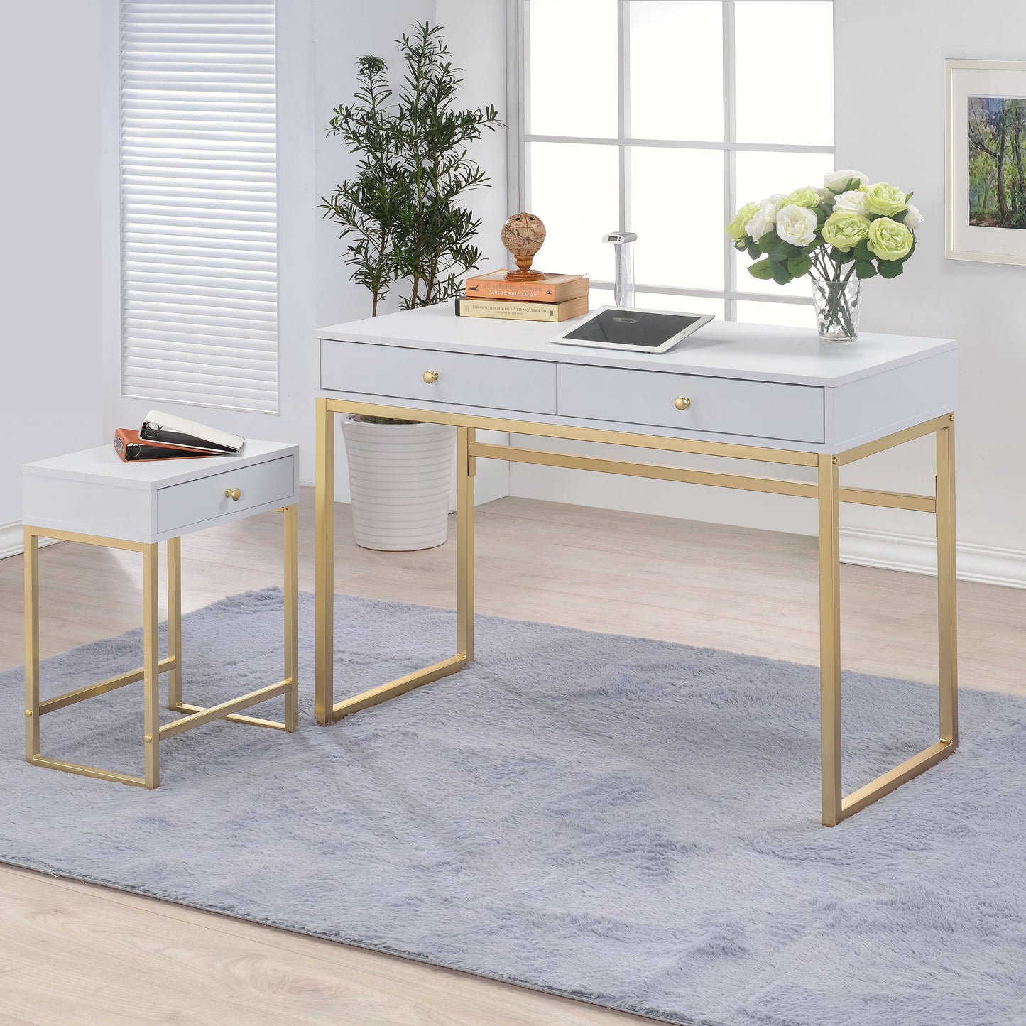 Modern white desk with gold metal legs two drawers and gold knobs perfect for home office