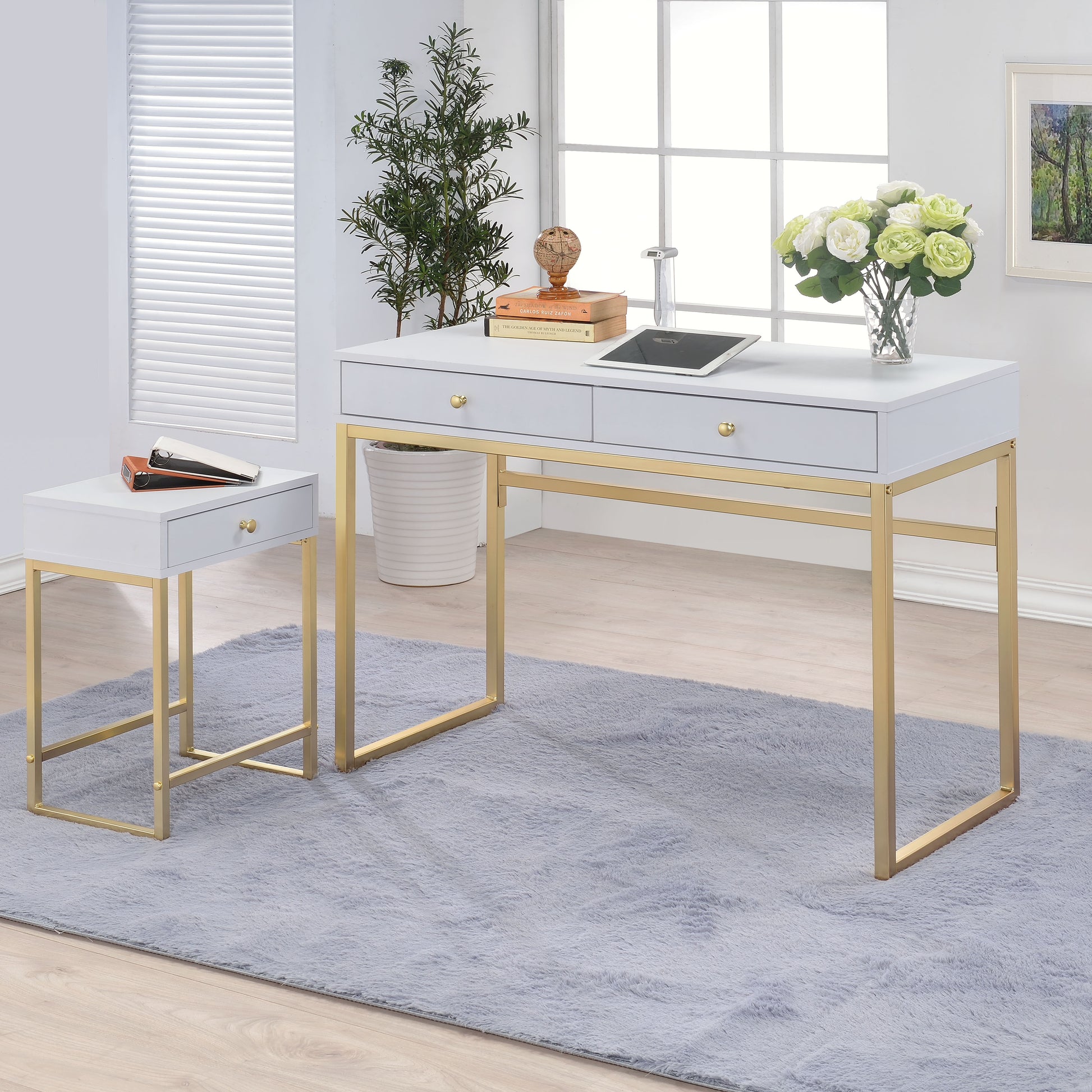 Modern white desk with gold metal legs two drawers and gold knobs perfect for home office