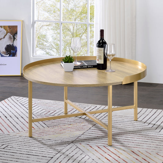 Round wood coffee table with gold metal legs and rim