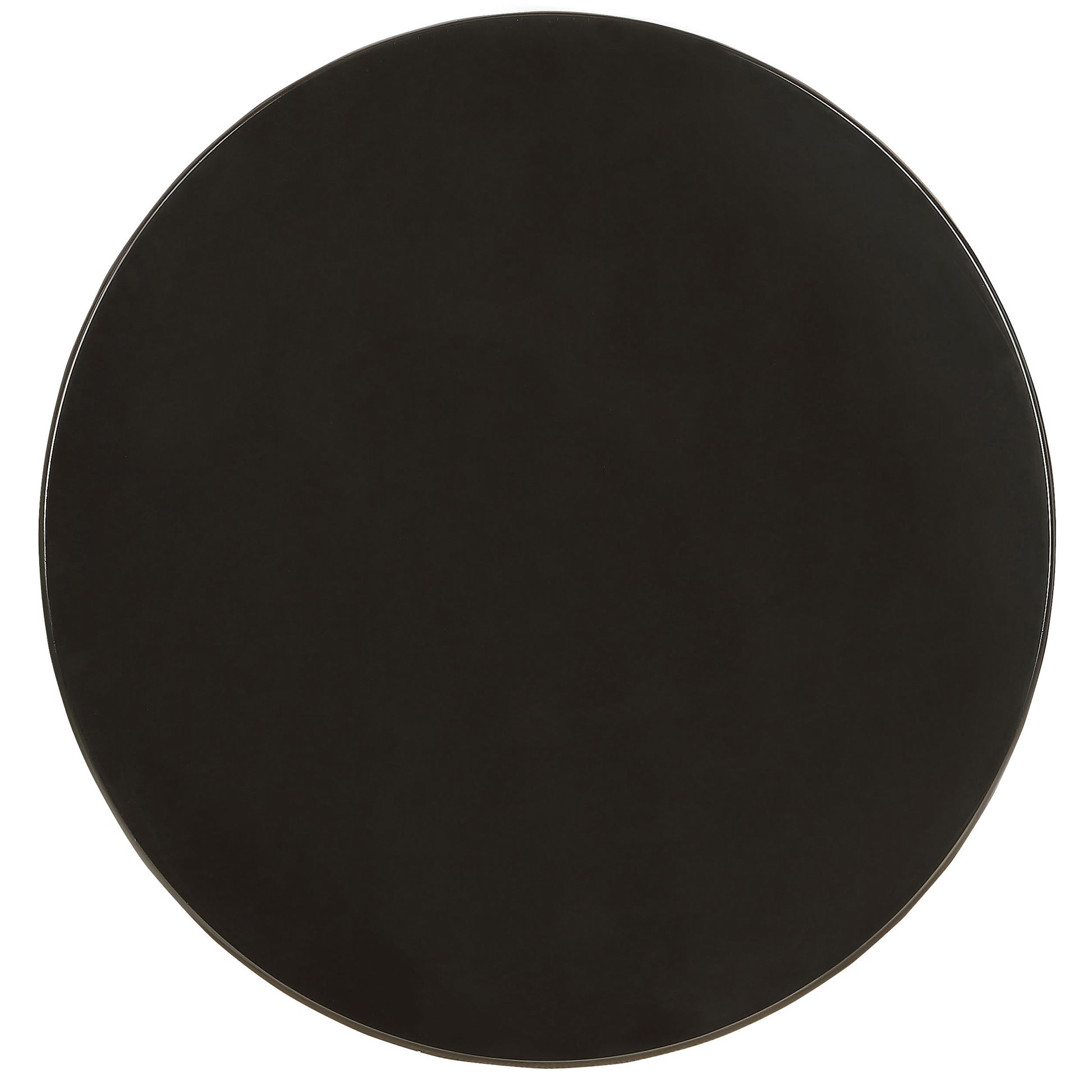 Glossy black round coffee table top on white background