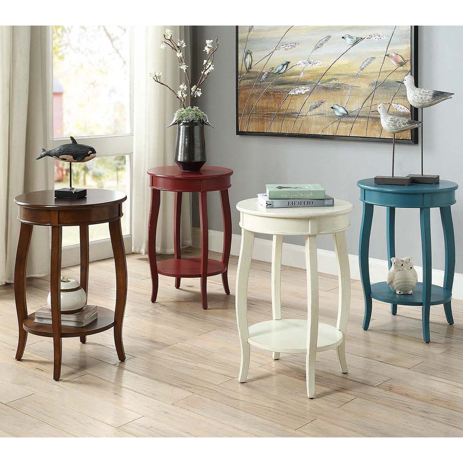 Dark brown wood round accent table with whale sculpture