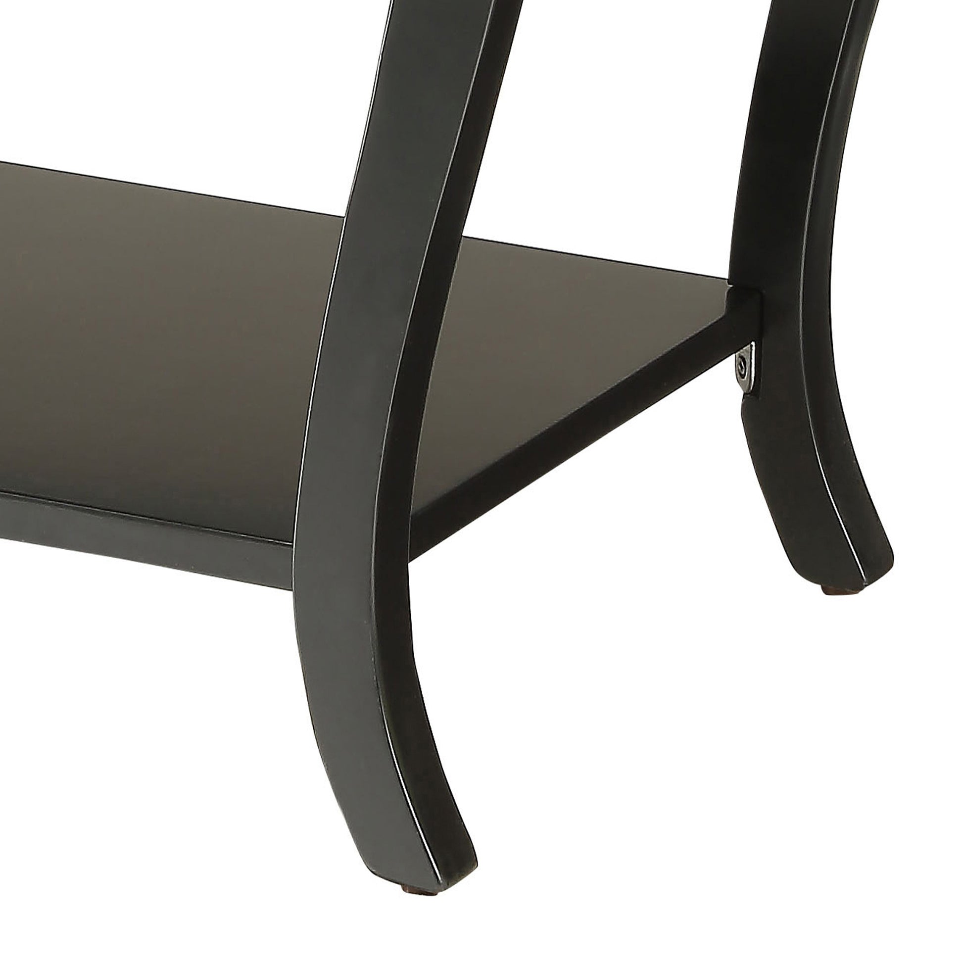 Black curved metal legs and shelf of a modern side table