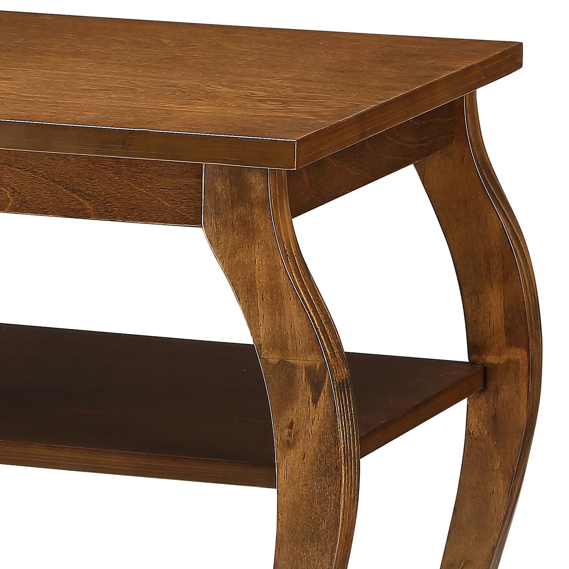 Curved leg detail of a dark oak end table with lower shelf