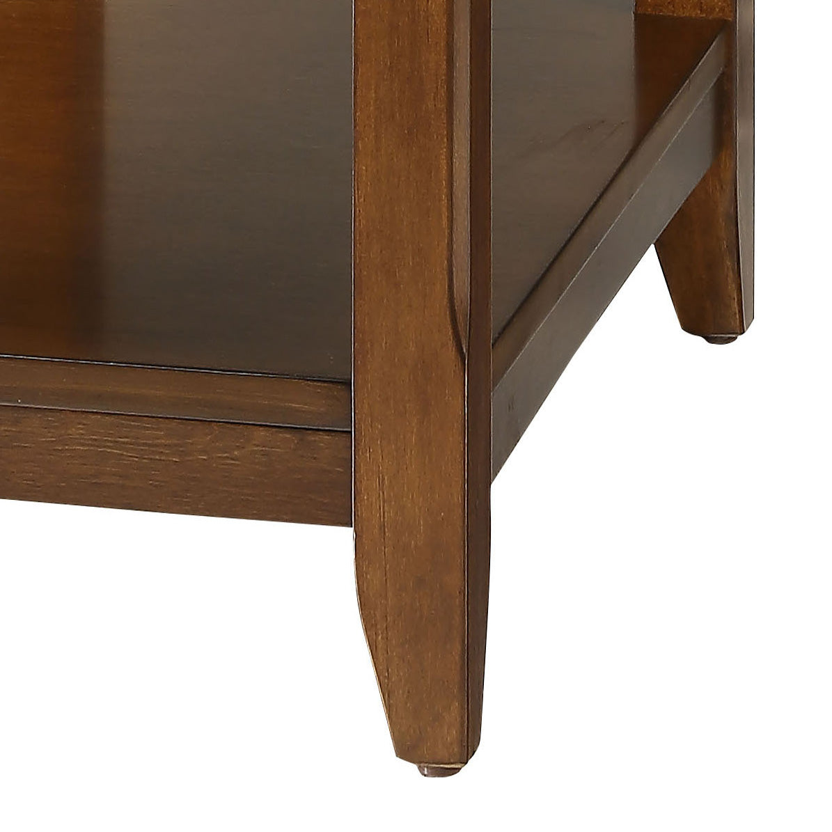Detail of a dark brown wood side table leg with subtle shaping suitable for living room furniture