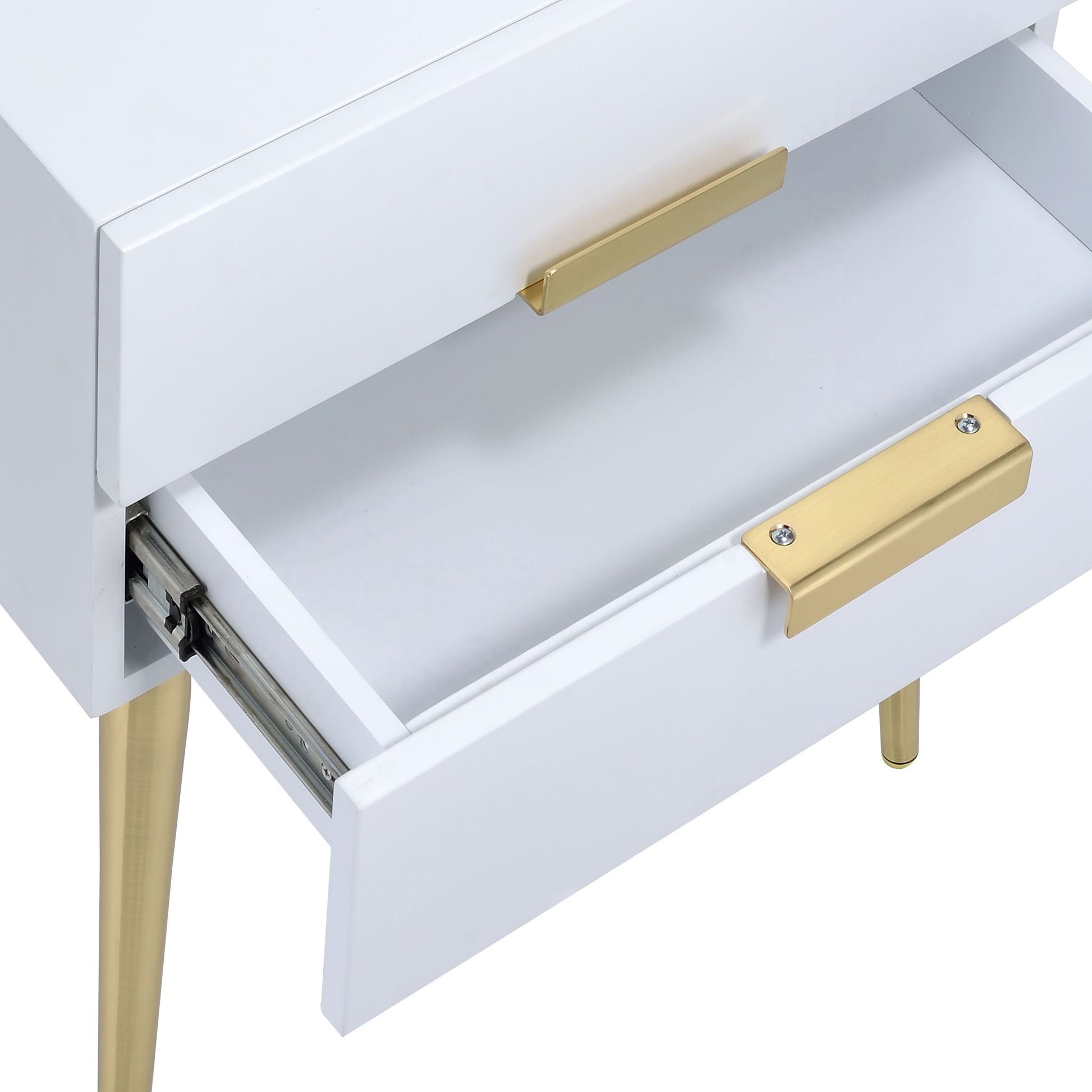 White bedside table with gold drawer pulls and tapered legs